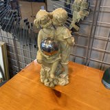Boy Kissing Girl Figurine