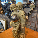 Boy Kissing Girl Figurine