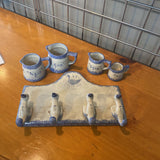 Ceramic Duck Hooks holding Measuring Cups