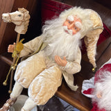 Sitting Santa w Horse Pole