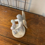 Porcelain Angel w/ 2 Children by Flavia