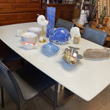 White Glass Self-Storing Leaf Expandable Table