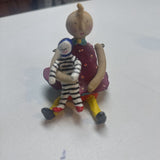 Girl w Striped Doll Figurine