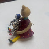Girl w Striped Doll Figurine