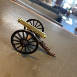 Canon Figurine