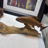 Carved Fish on Log